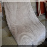 D72. 3 Faux fur throws. - $10 each 
